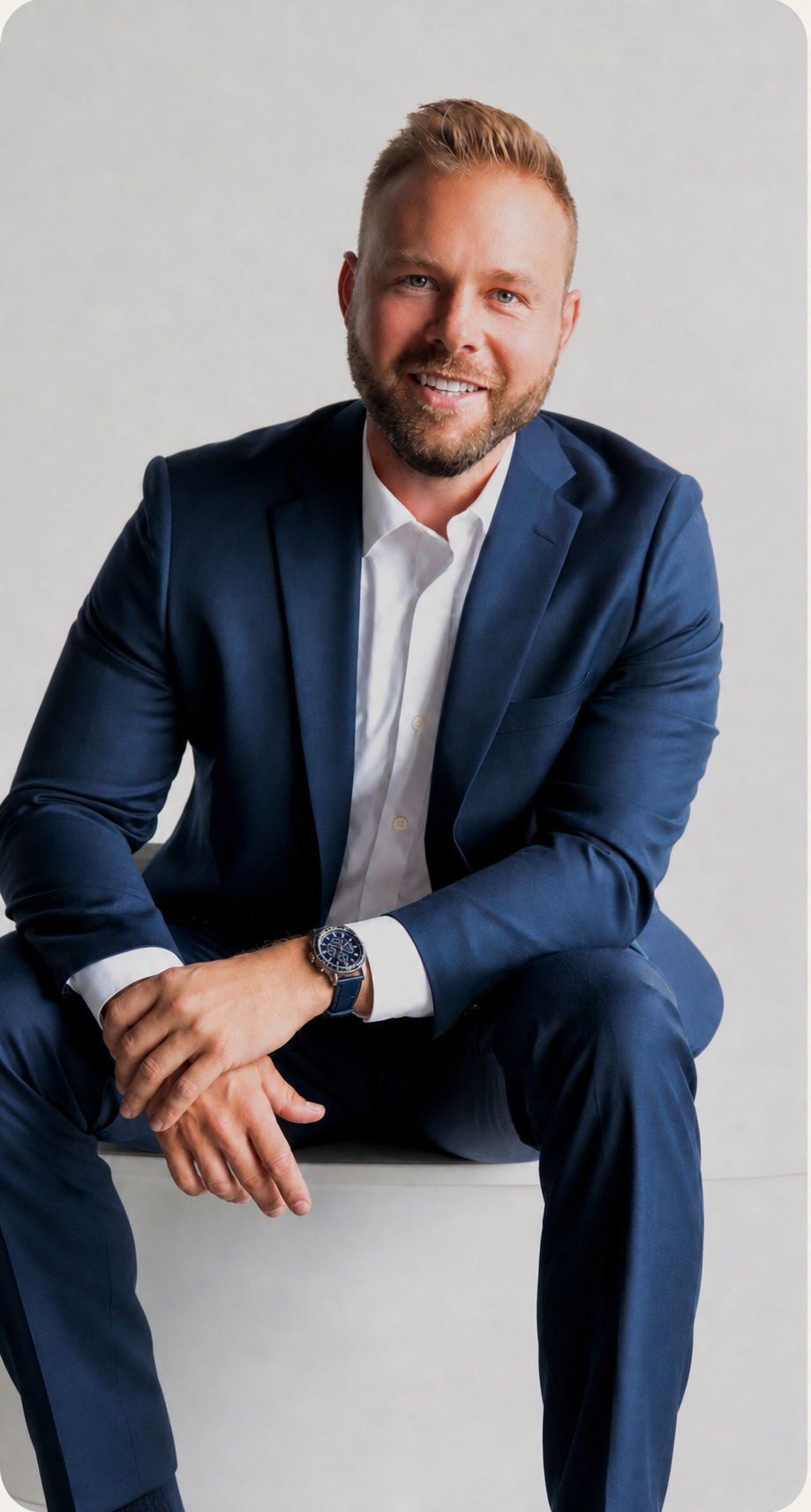 Travis Brizendine in a navy suit